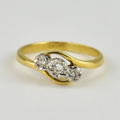 Lot 767 - A 9ct gold three-stone illusion set diamond...