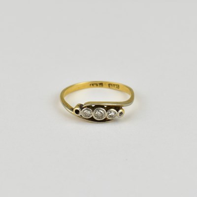 Lot 734 - An 18ct gold five-stone diamond ring, size M,...