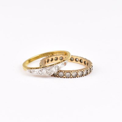 Lot 735 - An 18ct gold ring with five small graduated...