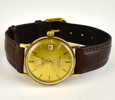 Lot 945 - TISSOT; a gentlemen's 9ct gold wristwatch, the...