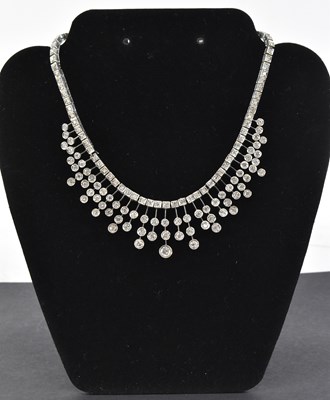 Lot 774 - A white metal Art Deco style frilled diamond...