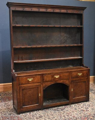 Lot 268 - An 18th century oak dresser, with boarded...