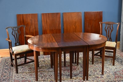 Lot 5 - A Georgian mahogany D-end dining table with...