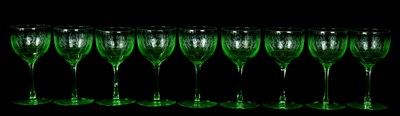 Lot 1497 - A set of nine Victorian etched uranium wine...