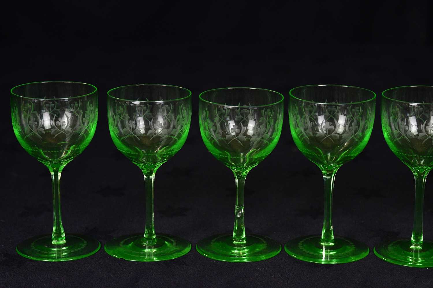 Lot 1497 - A set of nine Victorian etched uranium wine