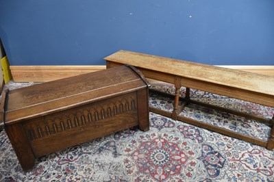 Lot 226 - An oak blanket chest with carved decoration,...