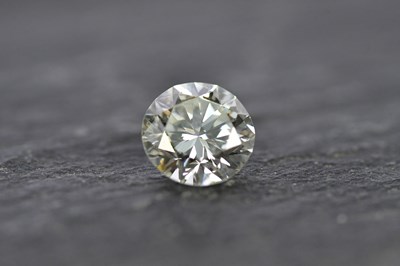 Lot 58 - A loose diamond, the round brilliant cut stone...