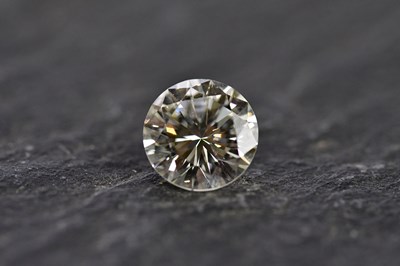 Lot 53 - A loose diamond, the round brilliant cut stone...