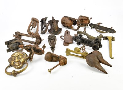 Lot 1229A - A collection of cast metal door knockers and...