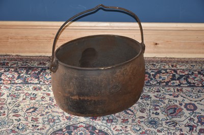 Lot 1217 - A cast iron cauldron, with single handle,...