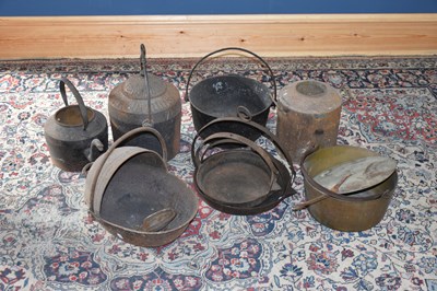 Lot 1205 - A collection of cast iron items to include...