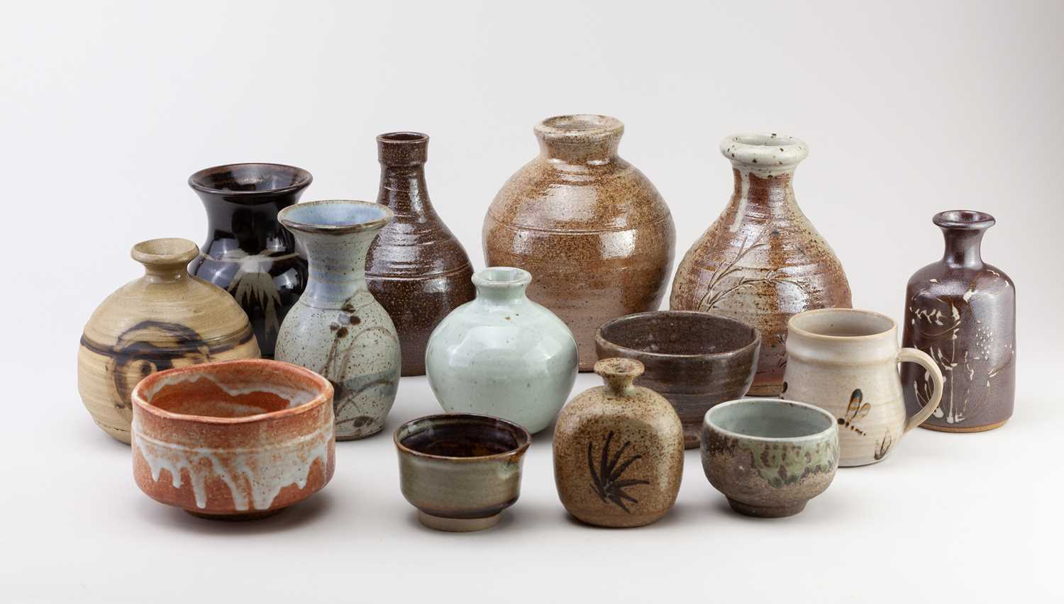 Lot 635 - A group of stoneware ceramics by different