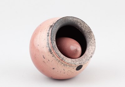 Lot 179 - ERIC MOSS (born 1959); a raku seed pod covered...