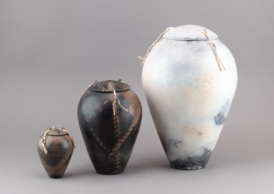 Lot 133 - DAVID OXLEY; a graduated trio of raku jars and...