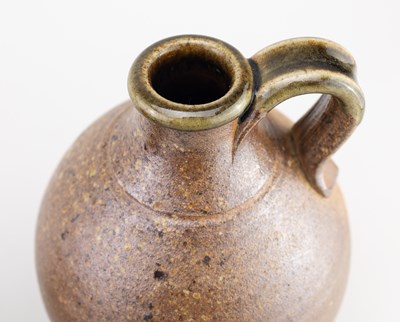 Lot 323 - Muchelney Pottery; a stoneware flagon with...