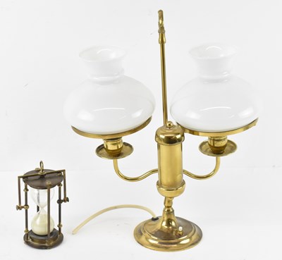 Lot 146 - A brass double oil burner lamp converted to...