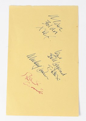 Lot 558 - T REX; a torn page from an autograph book...