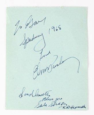 Lot 568 - ELVIS PRESLEY; a torn page from an autograph...