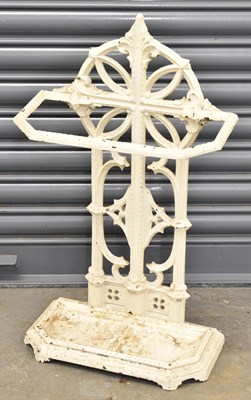 Lot 100 - A white painted cast iron stick stand, height...