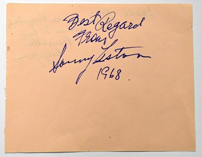 Lot 481 - SONNY LISTON; a torn page from an autograph...