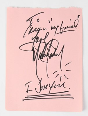 Lot 565 - MICHAEL JACKSON; a torn page from an autograph...