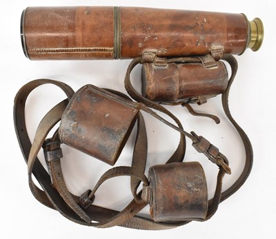 Lot 322 - A WWI military leather clad telescope,...