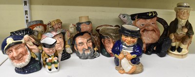 Lot 514 - ROYAL DOULTON; a group of nine ceramic...