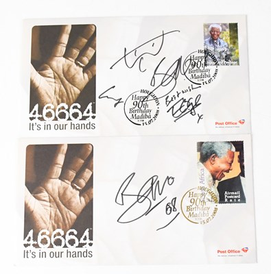 Lot 546 - U2; two first day covers signed by members of...