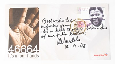 Lot 518 - NELSON MANDELA; a first day cover signed and...