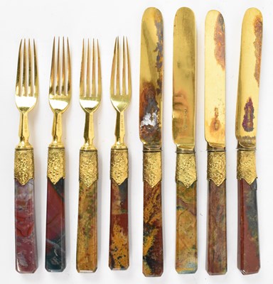 Lot 680 - A set of four gilt plated forks, with agate...