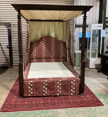 Lot 616 - A contemporary mahogany four poster bed with...