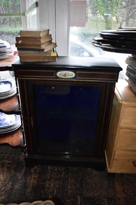 Lot 1216 - A Victorian ebonised pier cabinet with central...