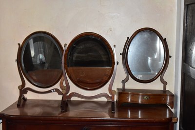 Lot 1235 - A pair of mahogany swing dressing table...