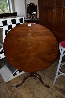 Lot 1240 - A Georgian mahogany tilt-top tripod table.