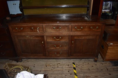 Lot 1246 - An 18th century oak dresser base with an...