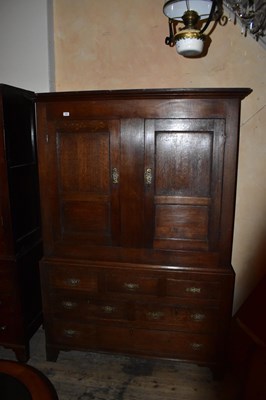 Lot 1264 - An 18th century oak press cupboard, the...