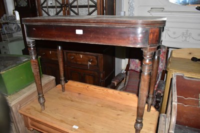 Lot 1311 - A Georgian mahogany fold-over tea table on...