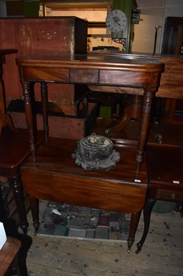 Lot 1334 - A 19th century mahogany fold-over tea table on...