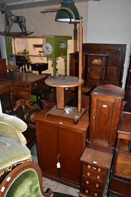 Lot 1337 - A mahogany twin door cupboard on plinth base,...