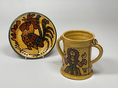 Lot 174 - MARY WONDRAUSCH; a slip glaze twin handled cup...