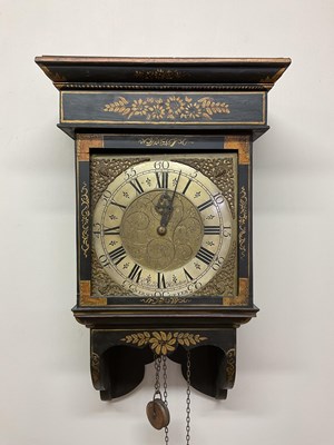 Lot 559 - A wall clock set with a thirty hour longcase...