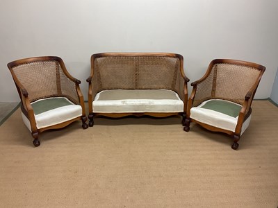 Lot 650 - An Edwardian three piece stained beech Bergère...