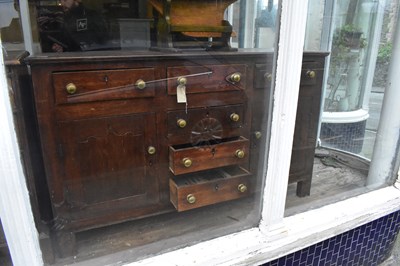 Lot 1342 - An 18th century oak dresser base with an...