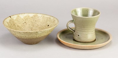 Lot 95 - Leach Pottery; a stoneware cup and saucer...