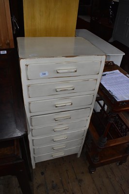 Lot 1349 - A painted chest of eight drawers on block legs,...