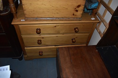 Lot 1367 - A pine chest of three drawers on bracket feet,...