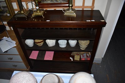 Lot 1397 - A mahogany open fronted bookcase with three...