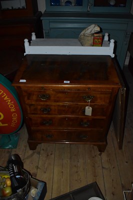 Lot 1416 - A reproduction walnut chest of drawers, with...