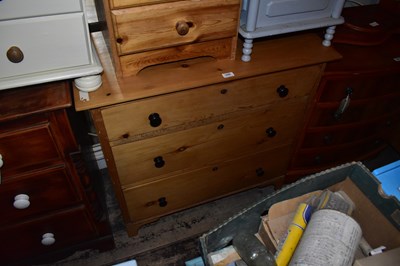 Lot 1436 - A pine chest of three drawers on bracket feet,...