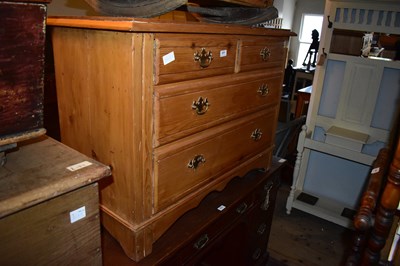 Lot 1471 - An early 20th century pine chest of two short...